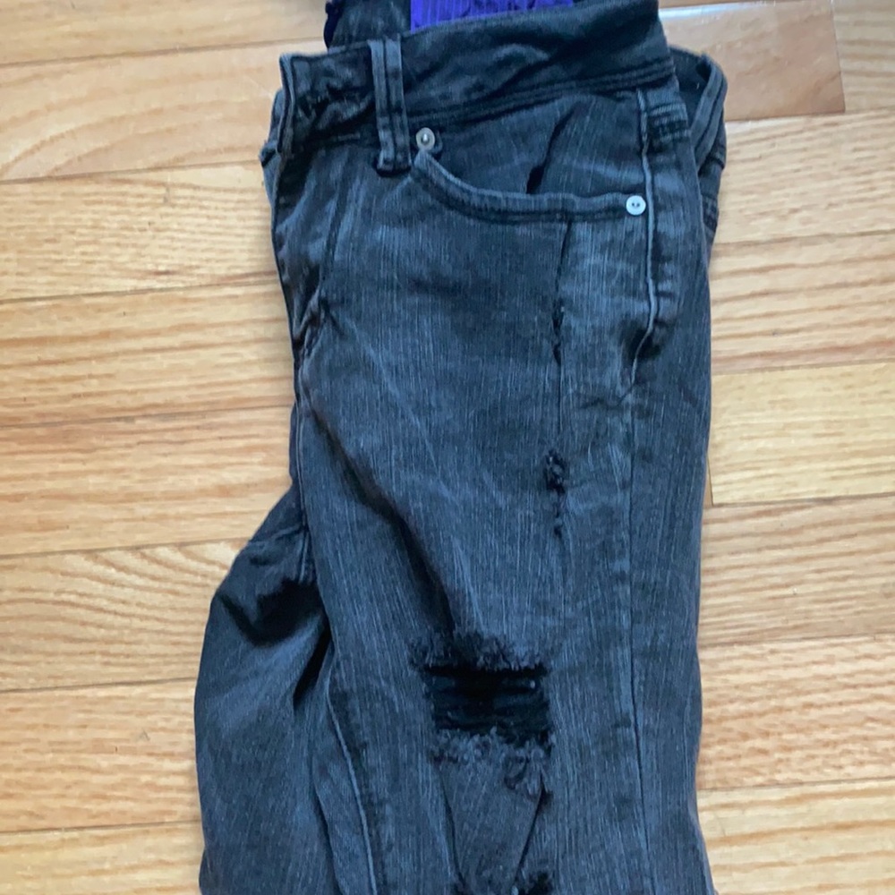 Black distressed ripped jeans